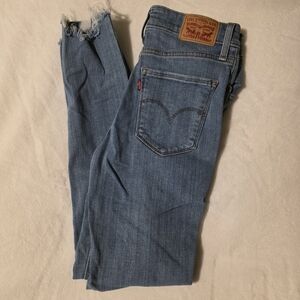 Levi's Light Wash Skinny Jeans with Distressed Hem